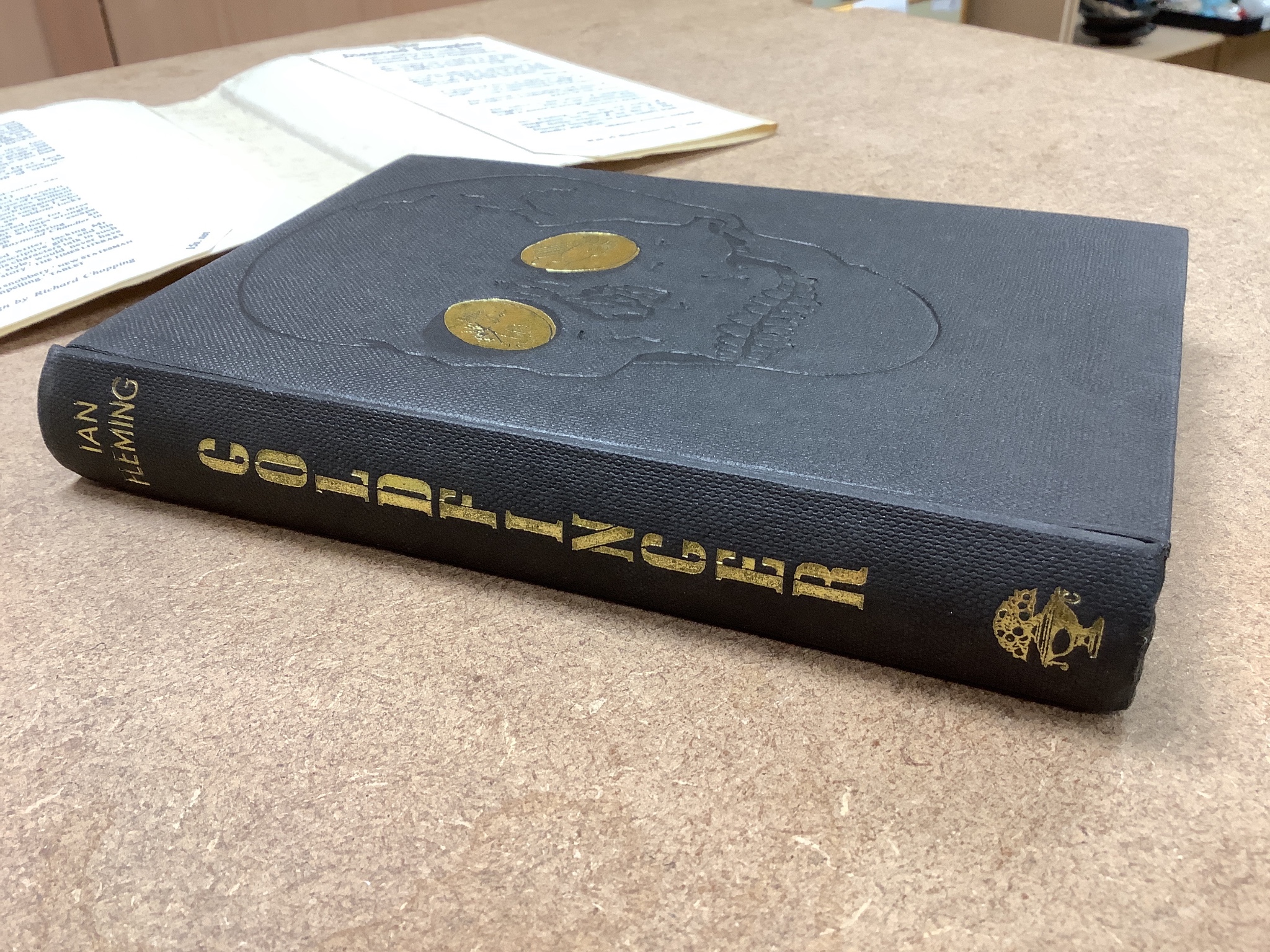 Fleming, Ian - Goldfinger, 1st edition, original black cloth with gilt lettering and embossed skull with unclipped d/j, designed by Richard Chopping, London, 1959